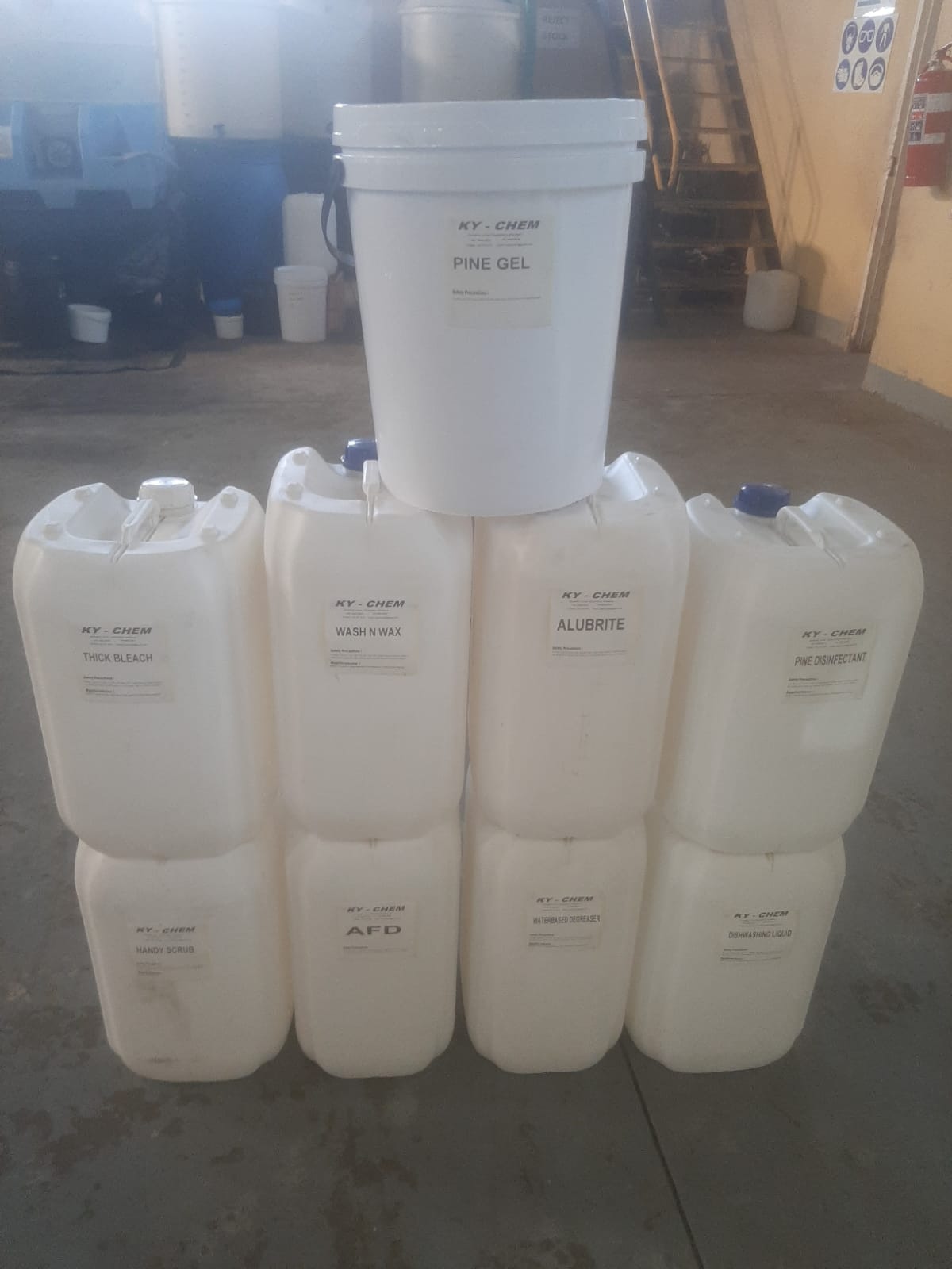 White buckets of chemicals produced by KY Chem based in Phoenix Industrial Park